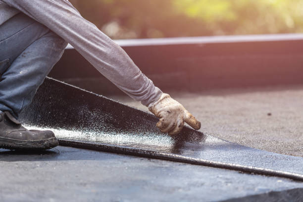 Professional Basement Waterproofing technician working in Bourbon, IN